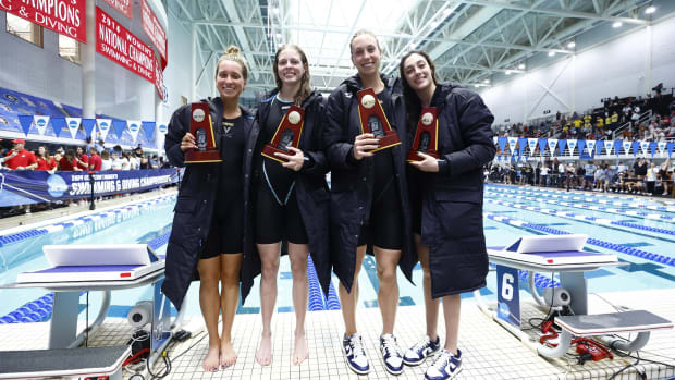 Carly Novelline, Maxine Parker, Gretchen Walsh, and Jasmine Nocentini pose with their trophies after winning the 200-yard medley relay title at the 2024 NCAA Women's Swimming & Diving Championships in Athens, Georgia.